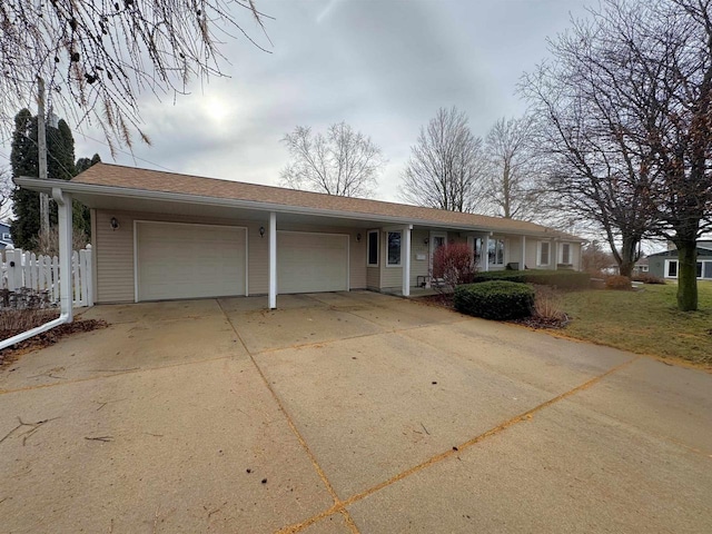 ranch-style home with a garage