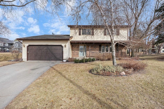 front of property with a garage and a front yard