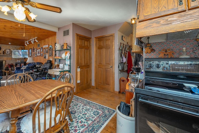 interior space featuring ceiling fan and light wood-type flooring