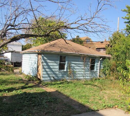 view of home's exterior featuring a yard