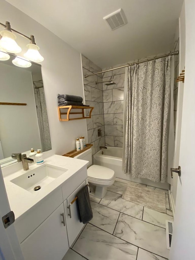 full bathroom with shower / bath combo, vanity, and toilet