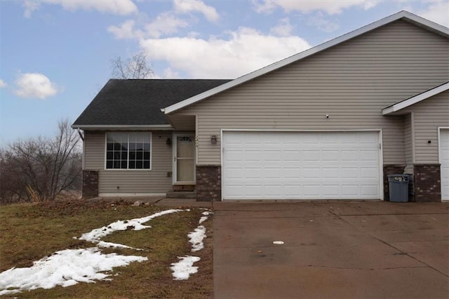 view of front of home with a garage