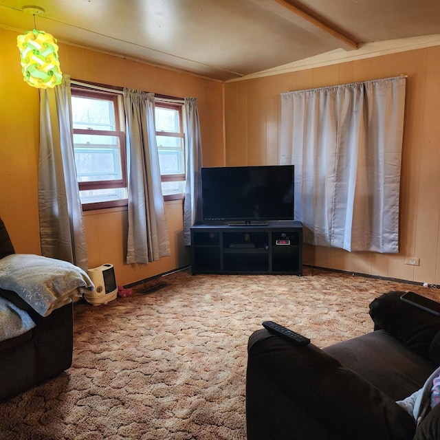 carpeted living room featuring crown molding