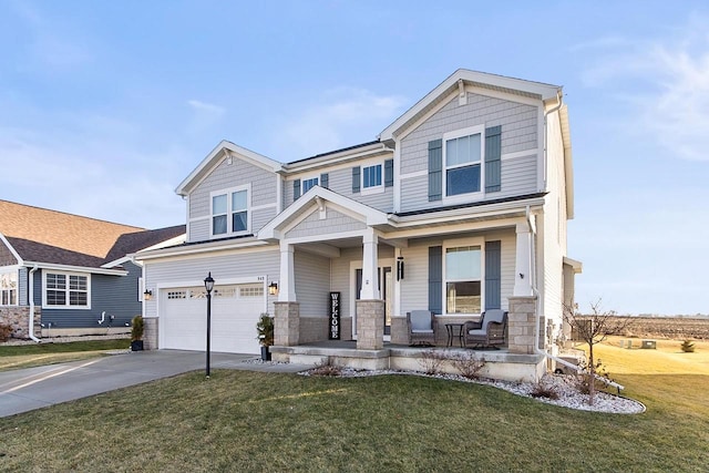 craftsman-style home with a front lawn, covered porch, and a garage