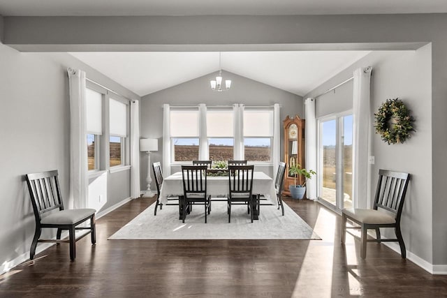 dining area featuring a chandelier, dark hardwood / wood-style flooring, and vaulted ceiling