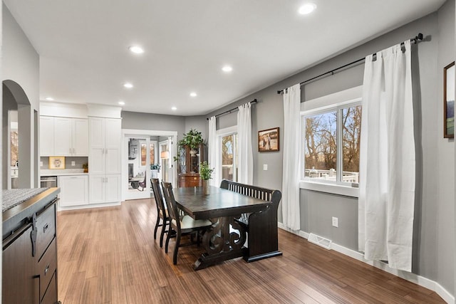 dining room with light hardwood / wood-style flooring