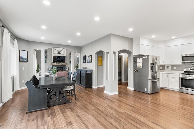 dining room with light wood-type flooring