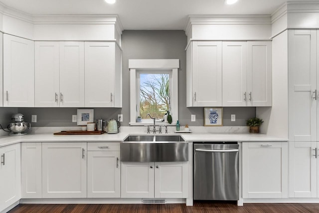 kitchen featuring sink, white cabinets, and stainless steel dishwasher