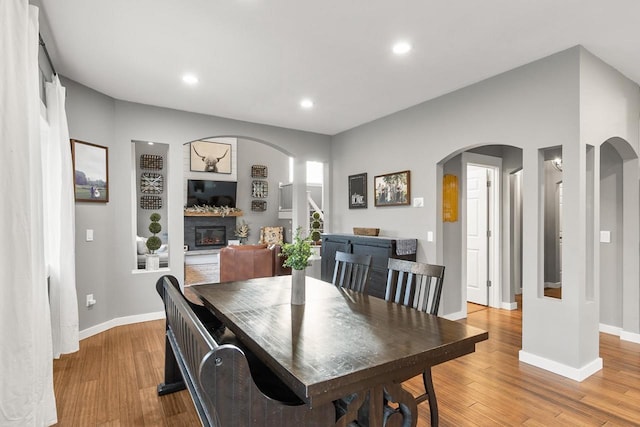 dining space with light wood-type flooring