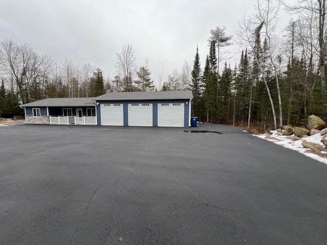 garage featuring covered porch