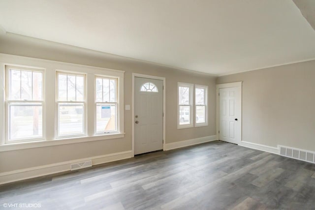 entryway with hardwood / wood-style flooring