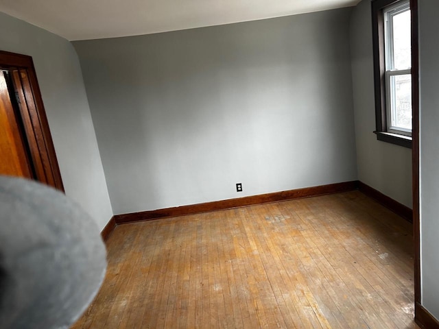 empty room with light wood-type flooring