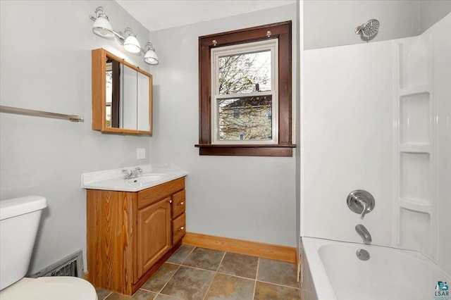 full bathroom with shower / tub combination, vanity, and toilet