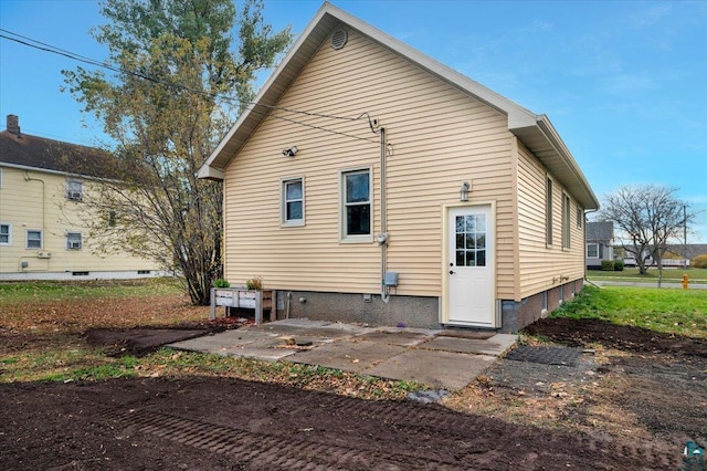 back of house featuring a patio