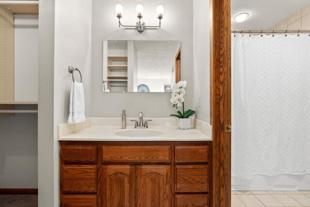 2022 27th St, Monroe, WI 53566 - full bath featuring tile patterned floors and vanity
