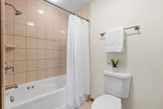 2022 27th St, Monroe, WI 53566 - bathroom featuring tile patterned floors, toilet, and shower / tub combo with curtain