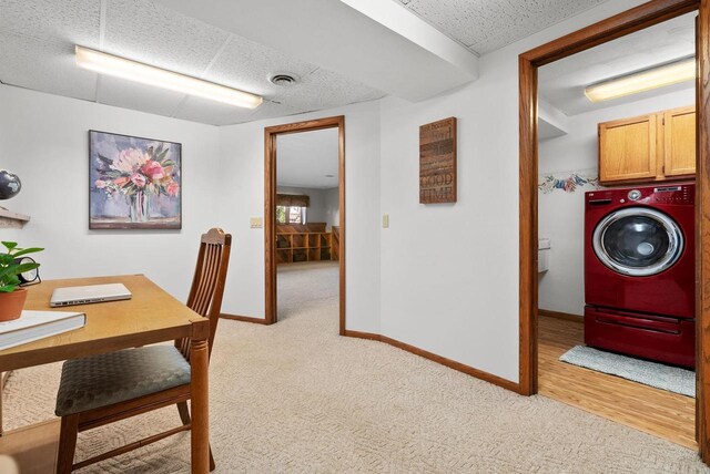 2022 27th St, Monroe, WI 53566 - laundry area with washer / clothes dryer, cabinet space, visible vents, and light carpet