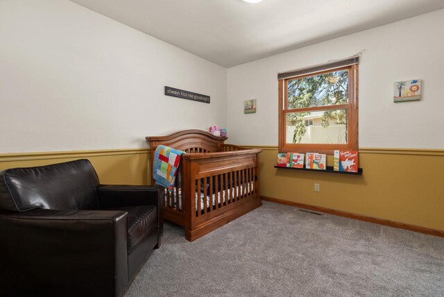 2022 27th St, Monroe, WI 53566 - bedroom featuring carpet flooring, visible vents, and baseboards