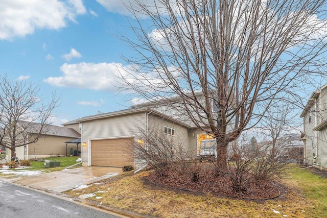 view of home's exterior with a garage