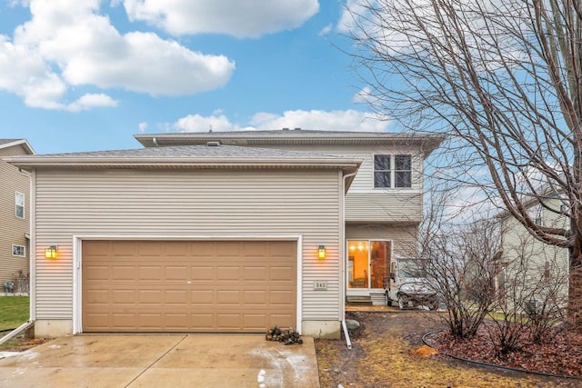 view of front of home with a garage