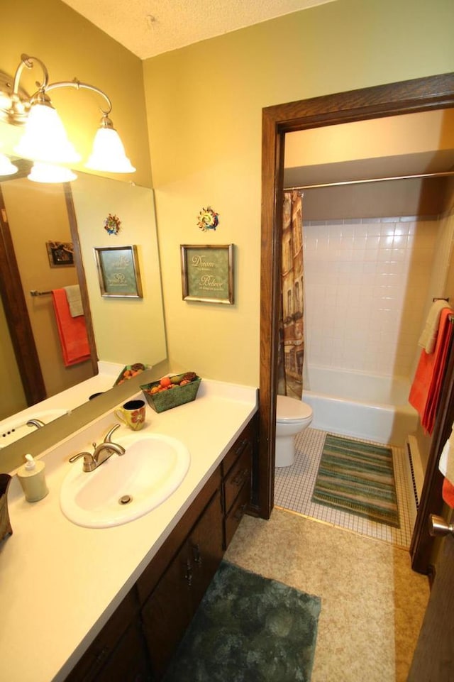 full bathroom featuring vanity, toilet, a textured ceiling, and shower / tub combo with curtain