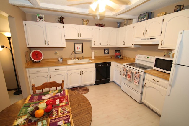 kitchen with white cabinetry, sink, ceiling fan, light hardwood / wood-style flooring, and white appliances