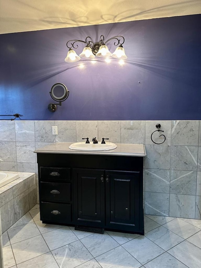 N7859 Lakeside Park Rd, Elkhart Lake, WI 53020 - bathroom with vanity, tiled bath, and tile walls