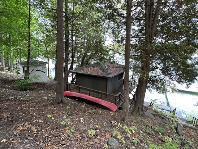 N7859 Lakeside Park Rd, Elkhart Lake, WI 53020 - view of property exterior with a shed