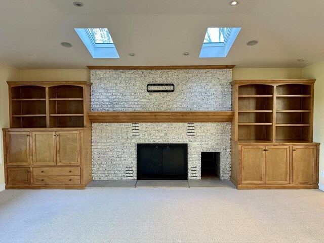 N7859 Lakeside Park Rd, Elkhart Lake, WI 53020 - unfurnished living room with vaulted ceiling and light carpet