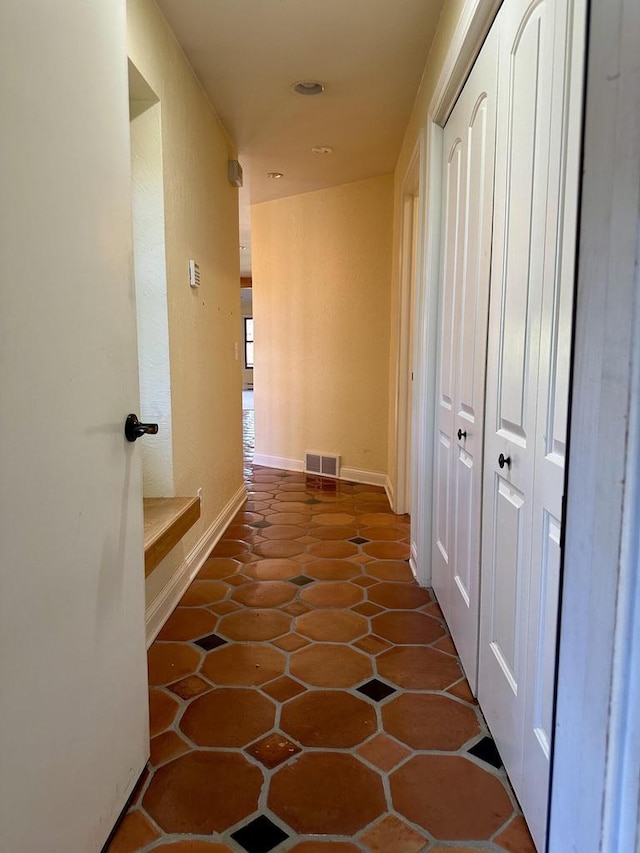N7859 Lakeside Park Rd, Elkhart Lake, WI 53020 - hallway featuring dark tile patterned flooring