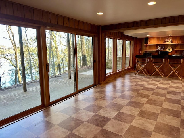 N7859 Lakeside Park Rd, Elkhart Lake, WI 53020 - doorway to outside featuring wooden walls