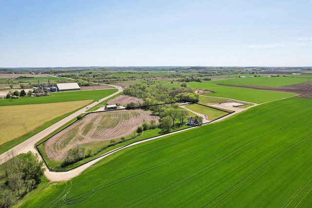 birds eye view of property featuring a rural view