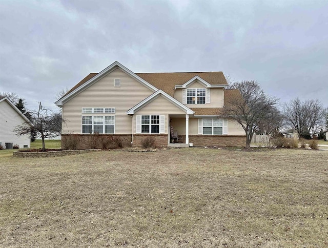 view of front of home with a front lawn