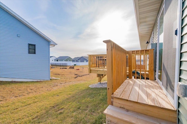 view of yard featuring a wooden deck