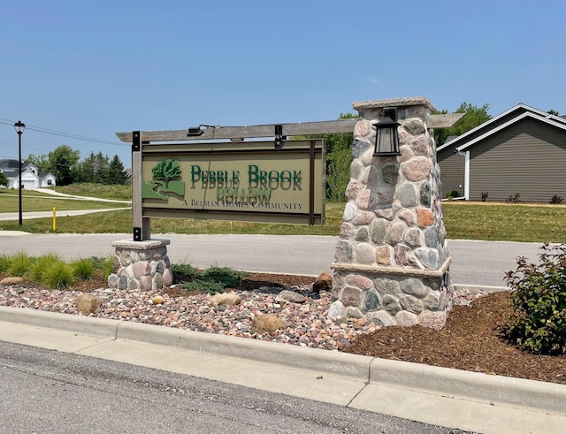 view of community sign