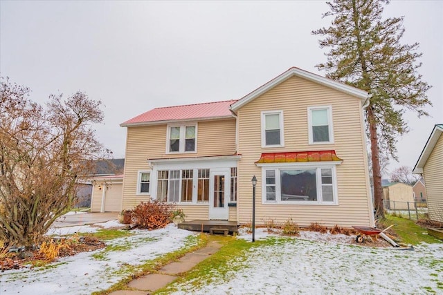 view of snow covered property