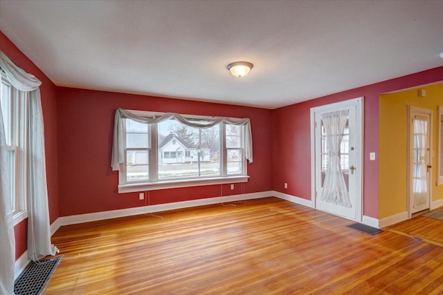 interior space with hardwood / wood-style flooring