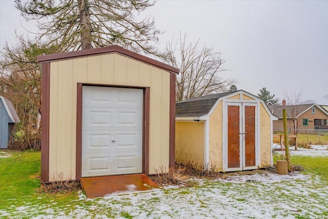 view of snow covered garage