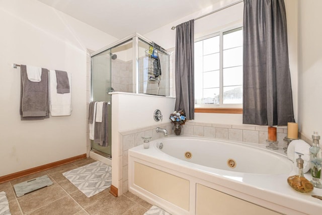 bathroom with tile patterned floors and separate shower and tub