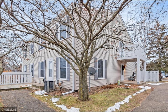 view of front of house with central AC unit