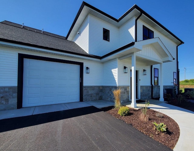 view of front of home featuring a garage