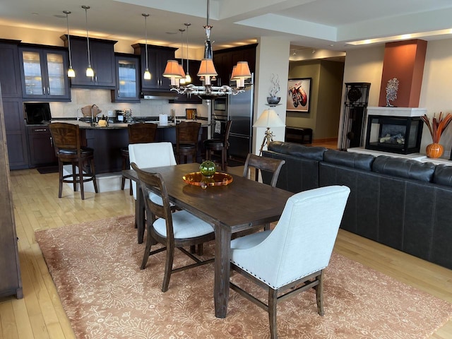 dining area with light wood-type flooring