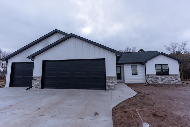 modern farmhouse style home with a garage