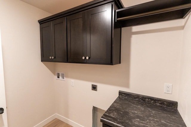 laundry area with washer hookup, light hardwood / wood-style flooring, cabinets, and hookup for an electric dryer