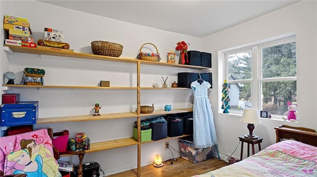 bedroom featuring hardwood / wood-style flooring