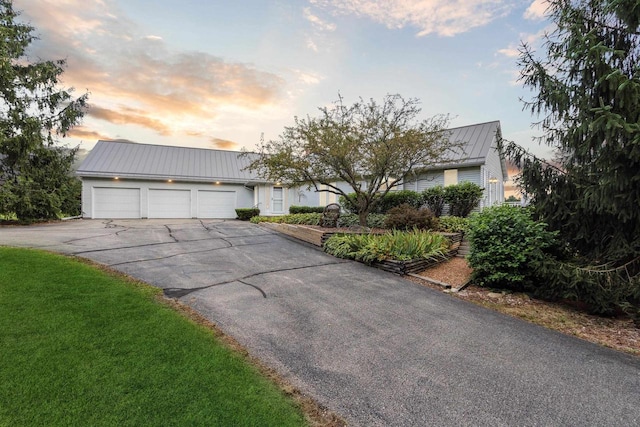 view of front of home featuring a garage