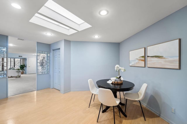 dining area featuring light hardwood / wood-style flooring