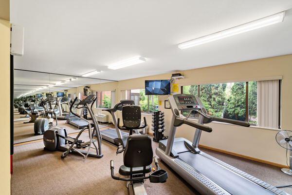 exercise room with a healthy amount of sunlight