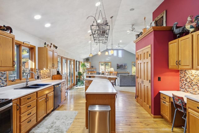 kitchen featuring a center island, tasteful backsplash, hanging light fixtures, and sink