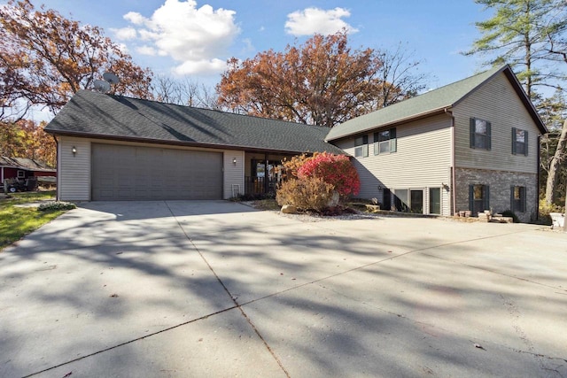 view of front of property with a garage